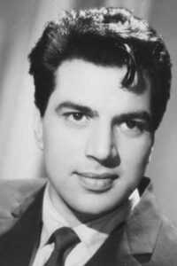 A classic black-and-white portrait of a young Indian film actor, used as an illustrative tribute image in a memorial article. Dharmendra death reason